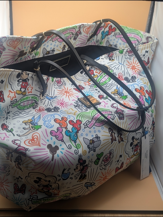 Dooney & Bourke Handbags - White Multicolor Disney Print Tote Bag with Black Straps
